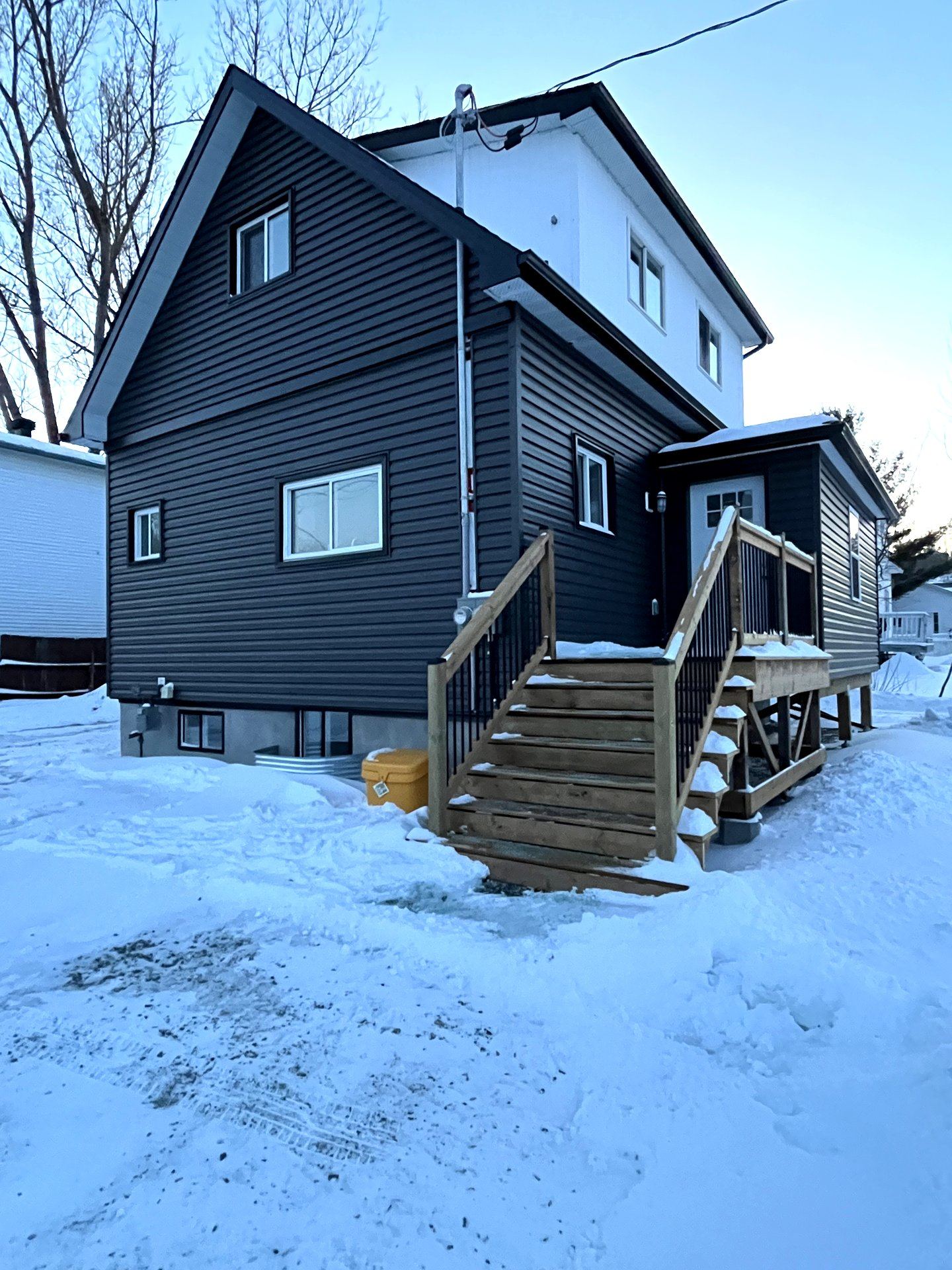 Completed exterior of 23 Ethel secondary-suite renovation by Steadfast Construction, Greater Sudbury